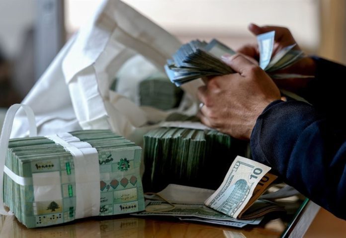 Crisis، Currency، Currency Board، Currency Exchange Rate، Currency Exchange Rate In Lebanon، Dollars Currency، Economy، Economy Crisis، Economy News، Lebanese Crisis، Lebanese Currency Exchange Rate، Lebanese Economy، Lebanese Economy Crisis، Lebanese Economy News، Lebanon Economy، Lebanon Economy News، The Lebanese Economic Crisis، The Lebanese Economy، The Lebanon Economic Crisis، أخبار إقتصادية، أخبار إقتصادية لبنانية، أخبار إقتصادية لبنانية محلية، أخبار إقتصادية محلية، أخبار إقتصادية محلية لبنانية، أخبار اقتصادية و سياسية في لبنان، إقتصاد، الأزمة الإقتصادية، الأزمة الإقتصادية اللبنانية، الأزمة الإقتصادية المحلية، الأزمة الإقتصادية في لبنان، الإقتصاد اللبناني، الإقتصاد في لبنان، تحديث سعر صرف الدولار الآن، سعر صرف الدولار، سعر صرف الدولار اليوم، سعر صرف الدولار اليوم السوق السوداء لحظة بلحظة، سعر صرف الدولار اليوم في السوق السوداء، سعر صرف الدولار اليوم في لبنان، سعر صرف الدولار اليوم في لبنان لحظة بلحظة، سعر صرف الدولار اليوم لبنان، سعر صرف الدولار اليوم لحظة بلحظة، سعر صرف الدولار في لبنان، سعر صرف الدولار في لبنان اليوم، سعر صرف الدولار في لبنان اليوم عند الصرافين، سعر صرف الدولار في لبنان لحظة بلحظة، سعر صرف الدولار لحظة بلحظة، سعر صرف الدولار لحظة بلحظة في لبنان، سعر صرف الدولار لحظة بلحظة… إليكم كم التسعيرة الحالية، تحليل الأزمة الاقتصادية في لبنان، الأسباب الكامنة وراء تدهور الاقتصاد اللبناني، أثر الأزمة الاقتصادية على حياة اللبنانيين، السياسات الاقتصادية في لبنان وتأثيرها على العملة، الدولار في السوق السوداء اللبنانية، أسعار الصرف الرسمية مقابل السوق السوداء في لبنان، التوقعات المستقبلية لسعر صرف الدولار في لبنان، تاريخ سعر صرف الدولار مقابل الليرة اللبنانية، استراتيجيات التكيف مع الأزمة الاقتصادية في لبنان، الدولار الأمريكي وتأثيره على الاقتصاد اللبناني، تحليل اقتصادي للوضع في لبنان، البنوك اللبنانية وأسعار صرف الدولار، التحديات الاقتصادية في لبنان، أحدث الأخبار الاقتصادية اللبنانية، التوقعات الاقتصادية للبنان، التحليلات الاقتصادية اليومية في لبنان، مستقبل الاقتصاد اللبناني، أخبار الدولار في لبنان، سعر صرف الدولار الرسمي اليوم في لبنان، أزمة الدولار في لبنان، التحديثات اليومية لسعر الدولار في لبنان، التحليل المالي للأزمة اللبنانية، أخبار السوق السوداء اللبنانية، أزمة العملة في لبنان، أثر الأزمة الاقتصادية على الليرة اللبنانية، التحليلات الاقتصادية عن لبنان، أخبار الدولار لحظة بلحظة في لبنان، مقارنة سعر الدولار بين الأسواق الرسمية والسوق السوداء، أهم الأخبار الاقتصادية في لبنان، أزمة السيولة المالية في لبنان، أخبار السوق المالية اللبنانية، تحليل سياسي اقتصادي للأزمة اللبنانية، الدولار في البنوك اللبنانية والسوق السوداء، التوجهات الاقتصادية في لبنان، سعر صرف الدولار في السوق السوداء اللبنانية، الوضع الاقتصادي الراهن في لبنان، تحليل سعر صرف الليرة اللبنانية، استراتيجيات الاستقرار الاقتصادي في لبنان، الأزمة المالية اللبنانية وأثرها على العملة، الاقتصاد العالمي وتأثيره على سعر صرف الدولار في لبنان، التحولات الاقتصادية في لبنان، تطور الأزمة الاقتصادية اللبنانية